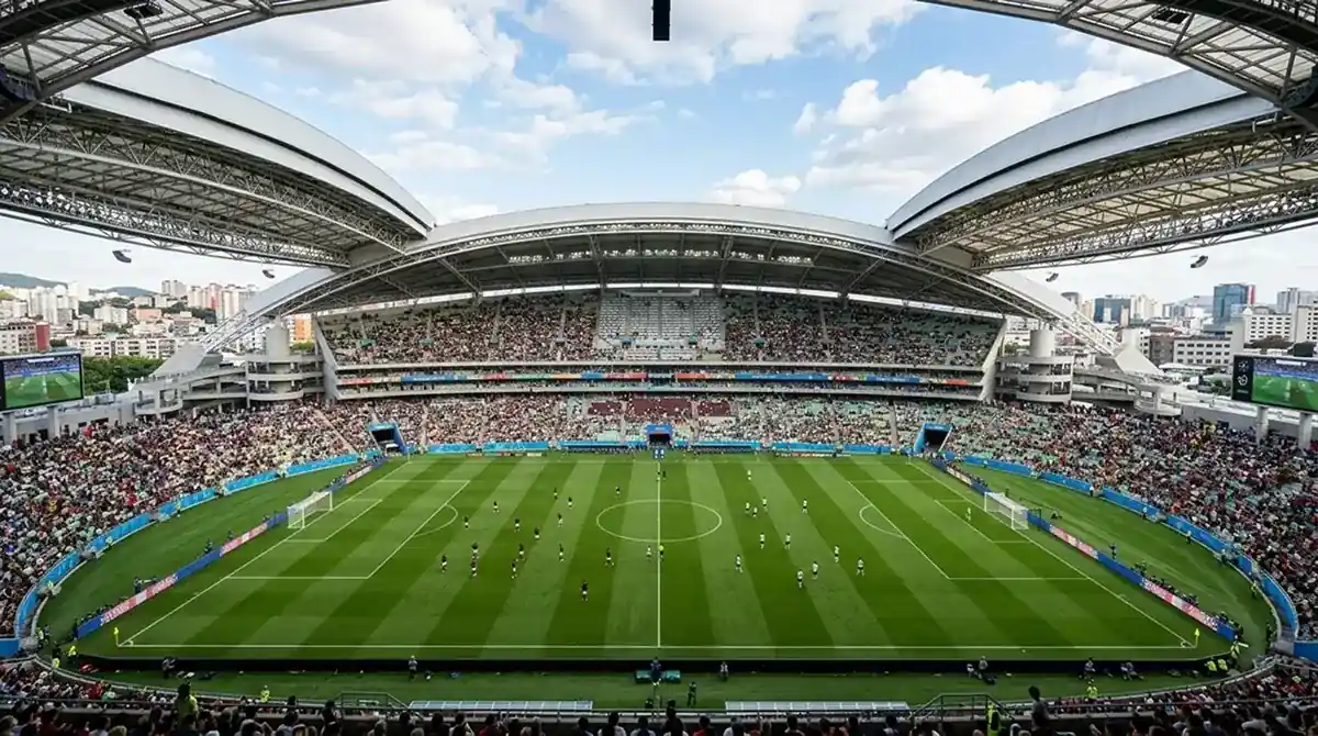 A large open-roof American football stadium set up for soccer under afternoon sun